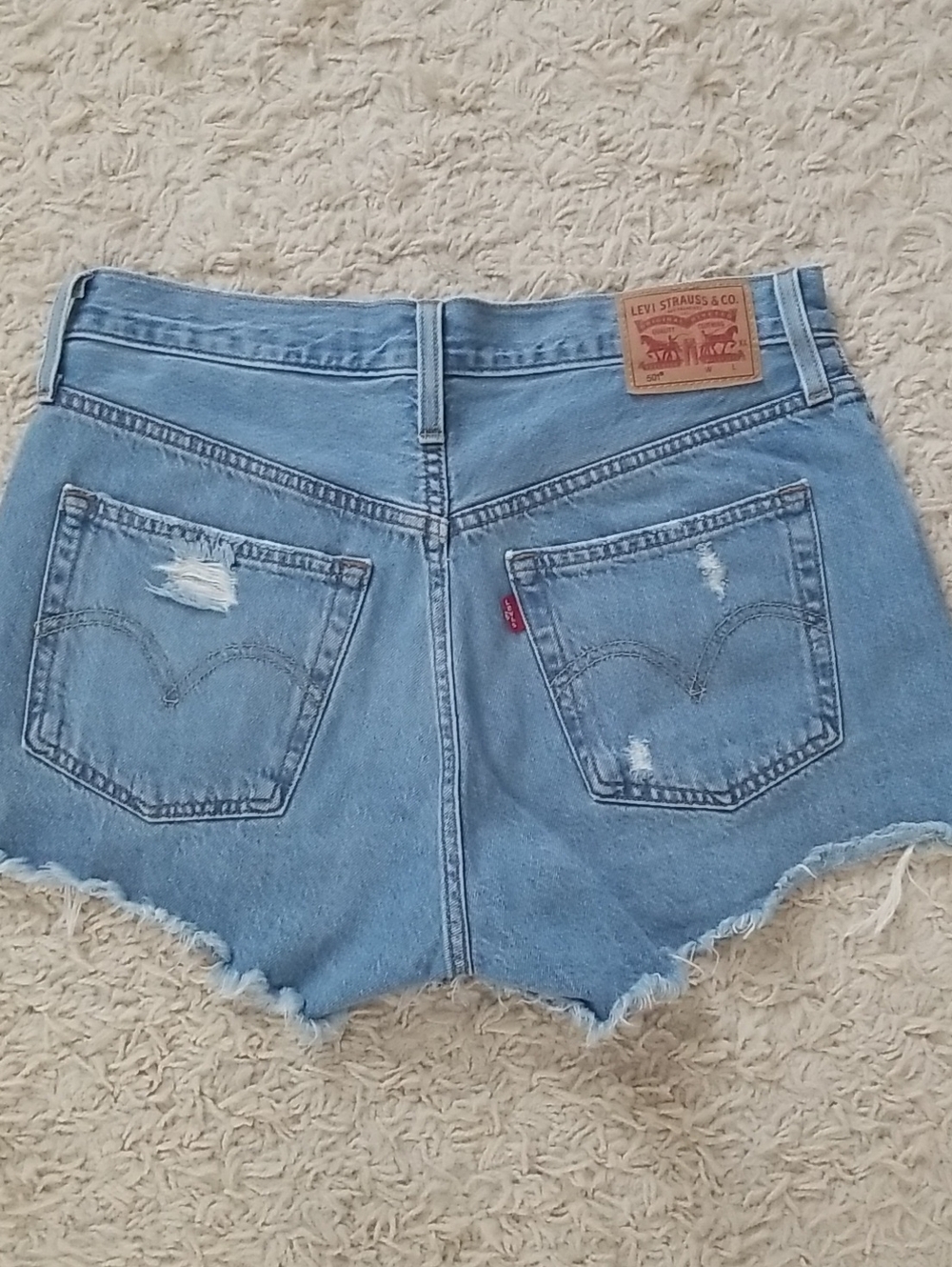 Levi's 501 Light Blue Distressed Denim Shorts